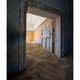 Image for article titled Colorful Desert Ruins Consumed by Waves of Sand